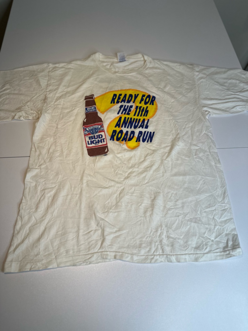 White Graphic Undershirt with Yellow & Blue Event Print